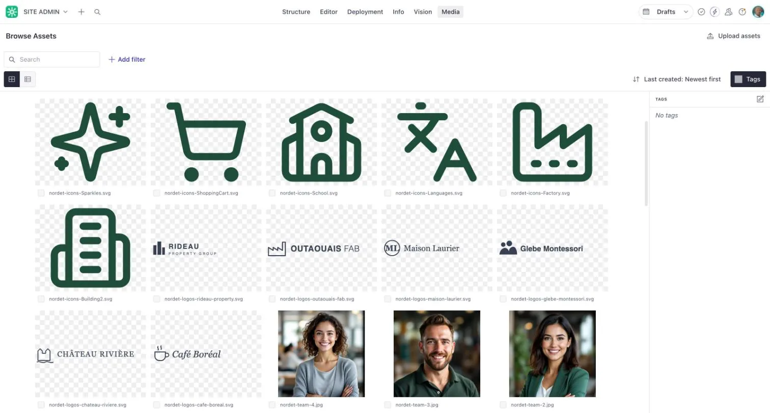 The Media library showing the site’s images and files in a grid, with an Upload assets button